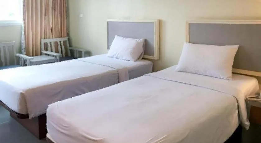 Bed in J Two S Pratunam Hotel