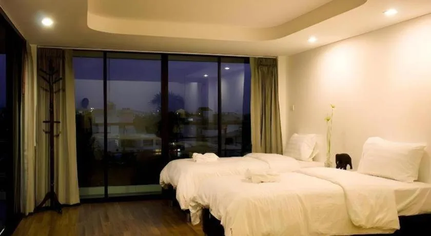 Bed in De Poem Loft Boutique Residence