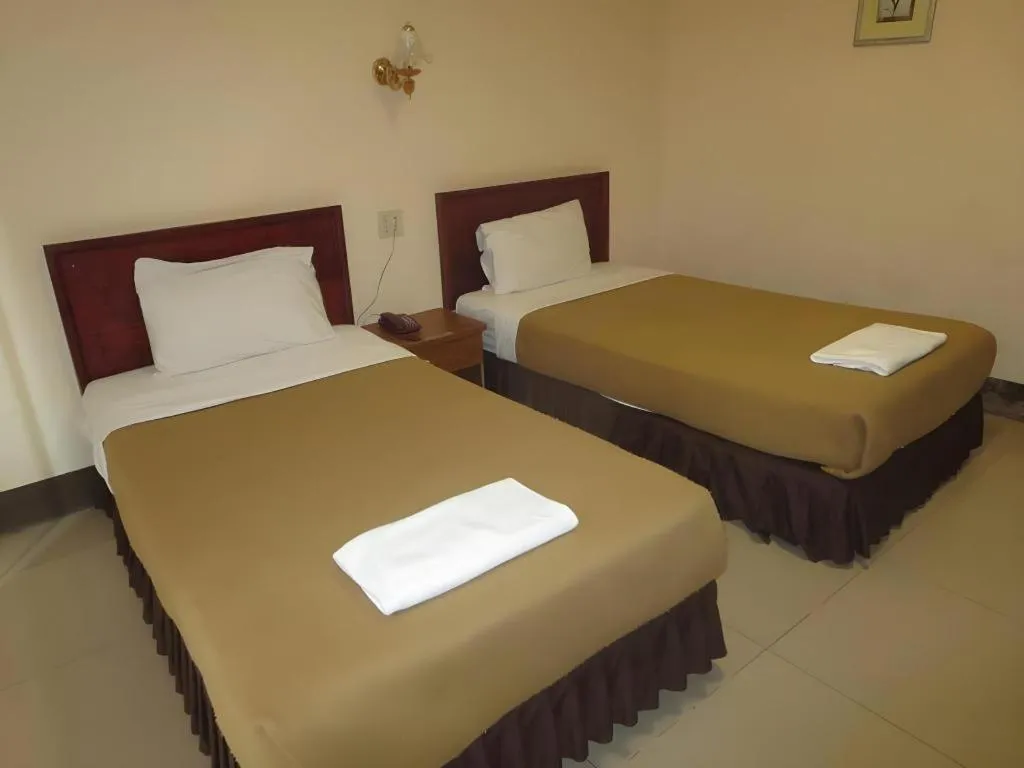 Bed in Chaleunehoung Hotel