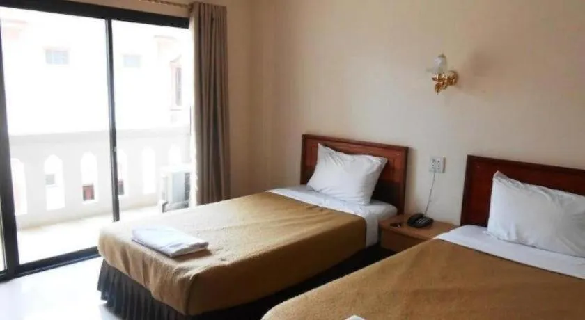 Bed in Chaleunehoung Hotel