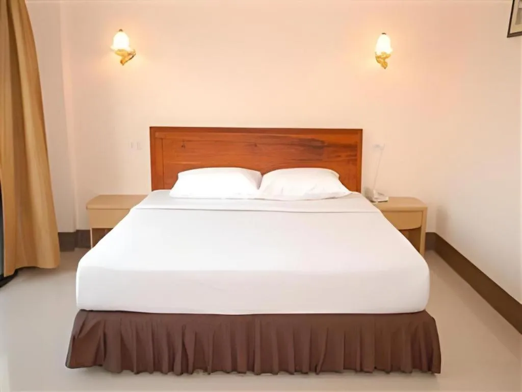 Bed in Chaleunehoung Hotel