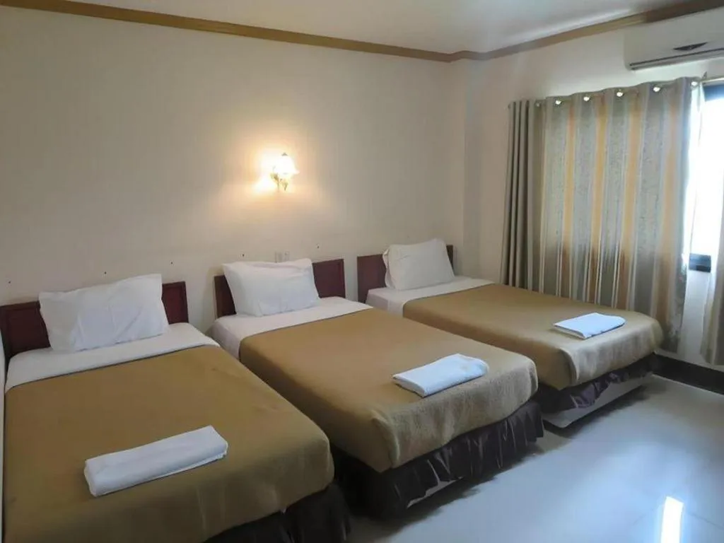 Bed in Chaleunehoung Hotel