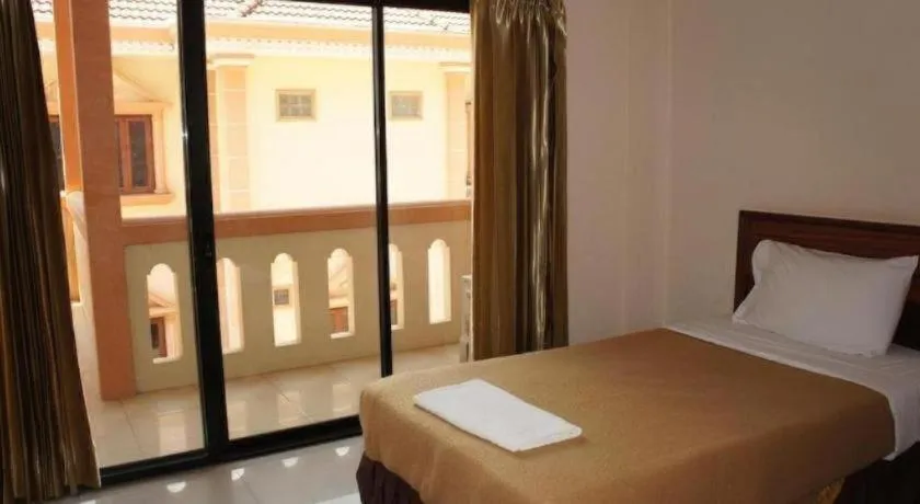 Bed in Chaleunehoung Hotel