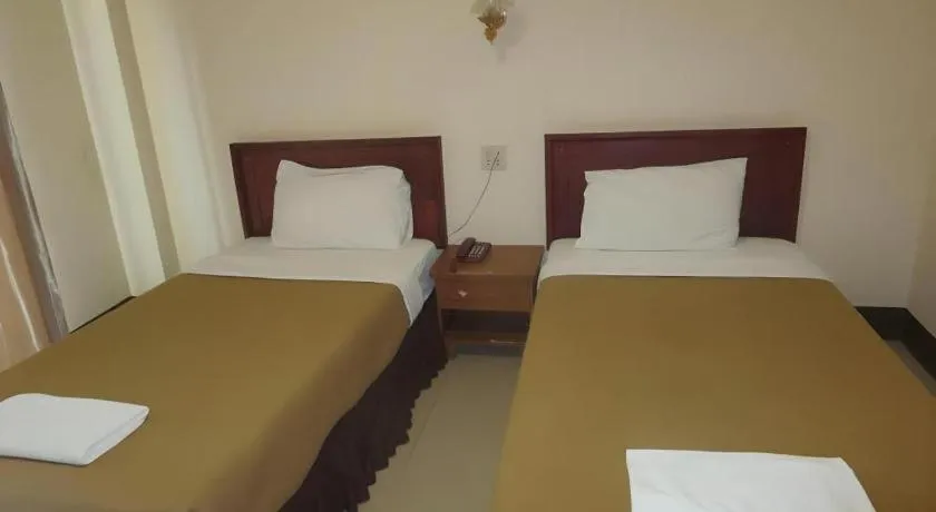 Bed in Chaleunehoung Hotel