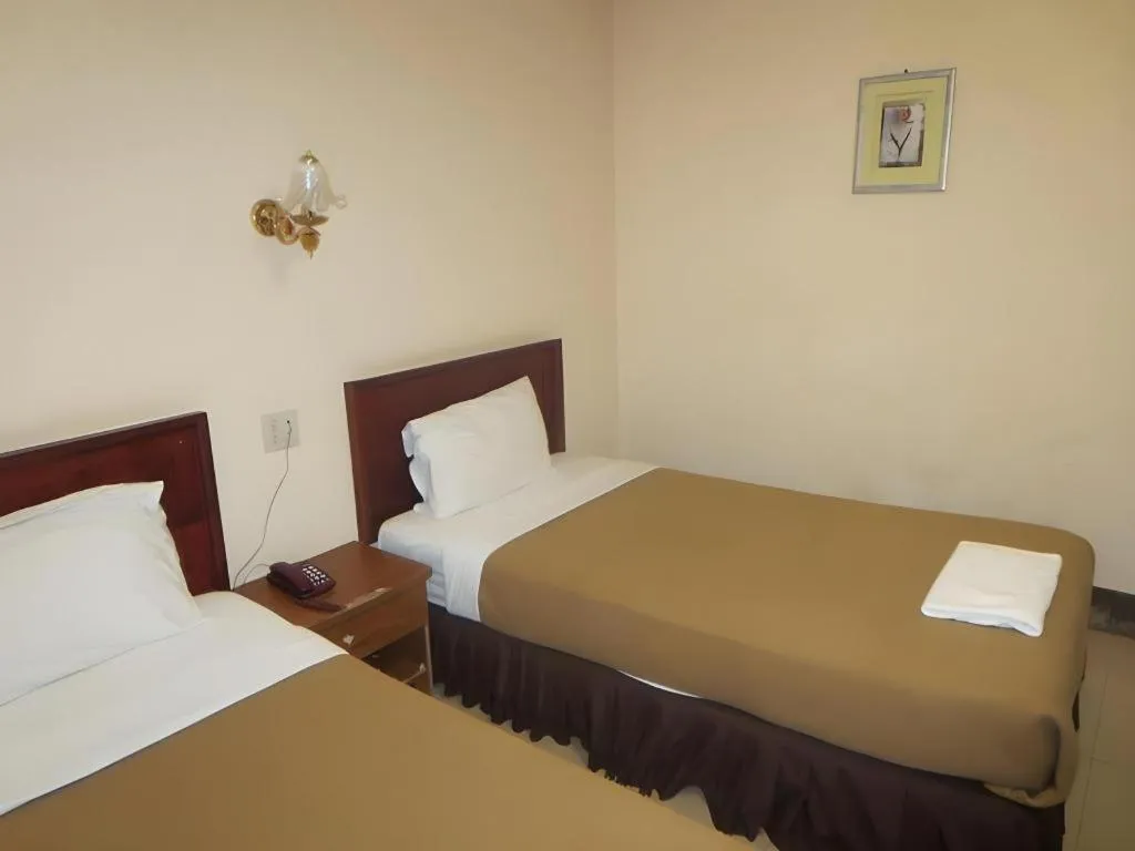 Bed in Chaleunehoung Hotel