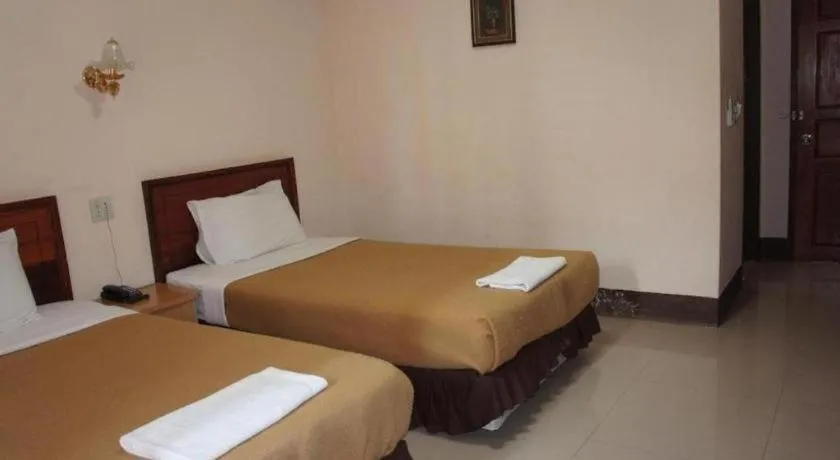 Bed in Chaleunehoung Hotel