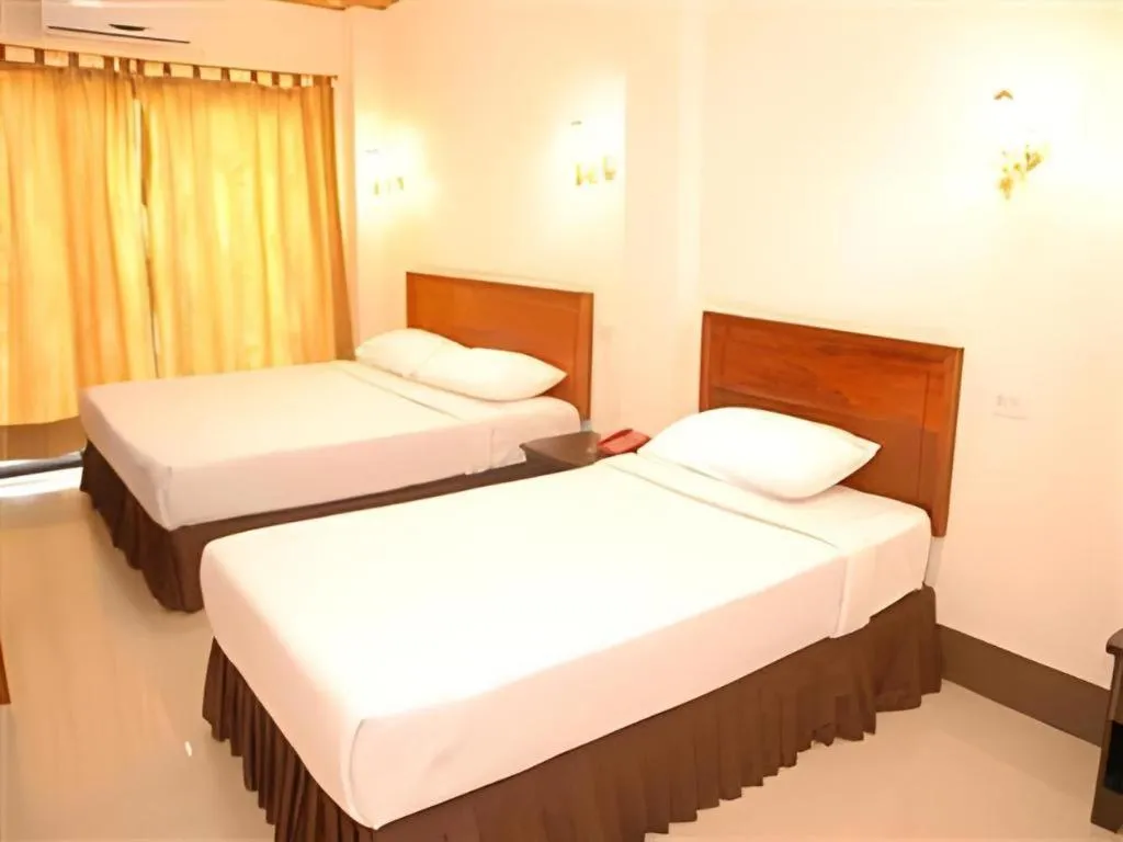 Bed in Chaleunehoung Hotel