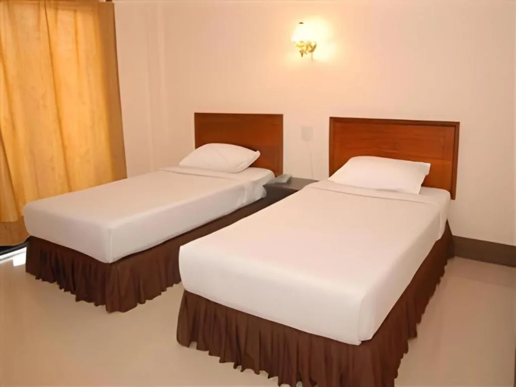 Bed in Chaleunehoung Hotel