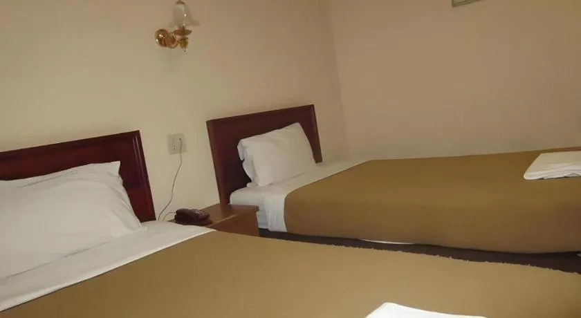 Bed in Chaleunehoung Hotel