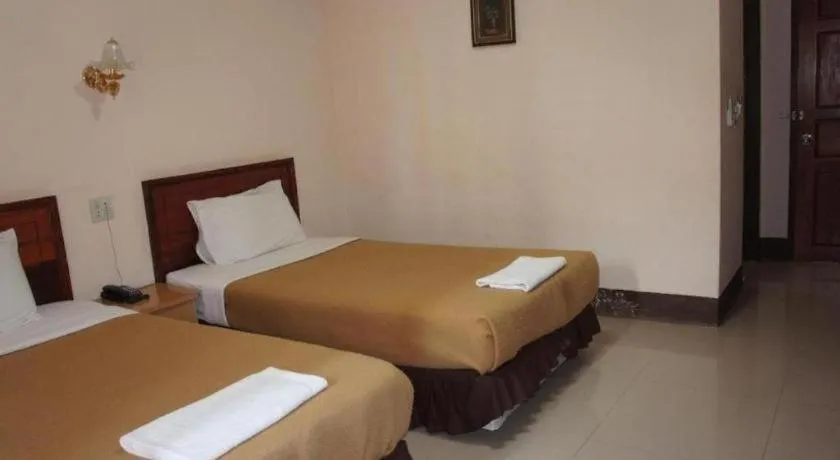 Bed in Chaleunehoung Hotel