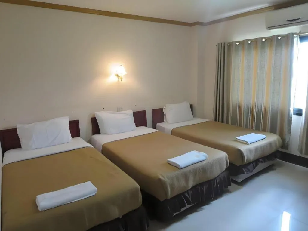 Bed in Chaleunehoung Hotel