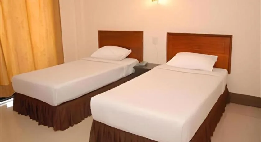 Bed in Chaleunehoung Hotel