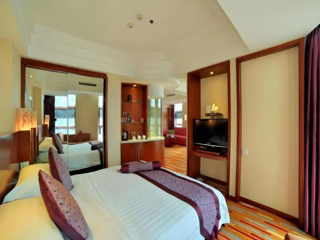 Bed in Gem Flower Jinyu Sunshine Hotel