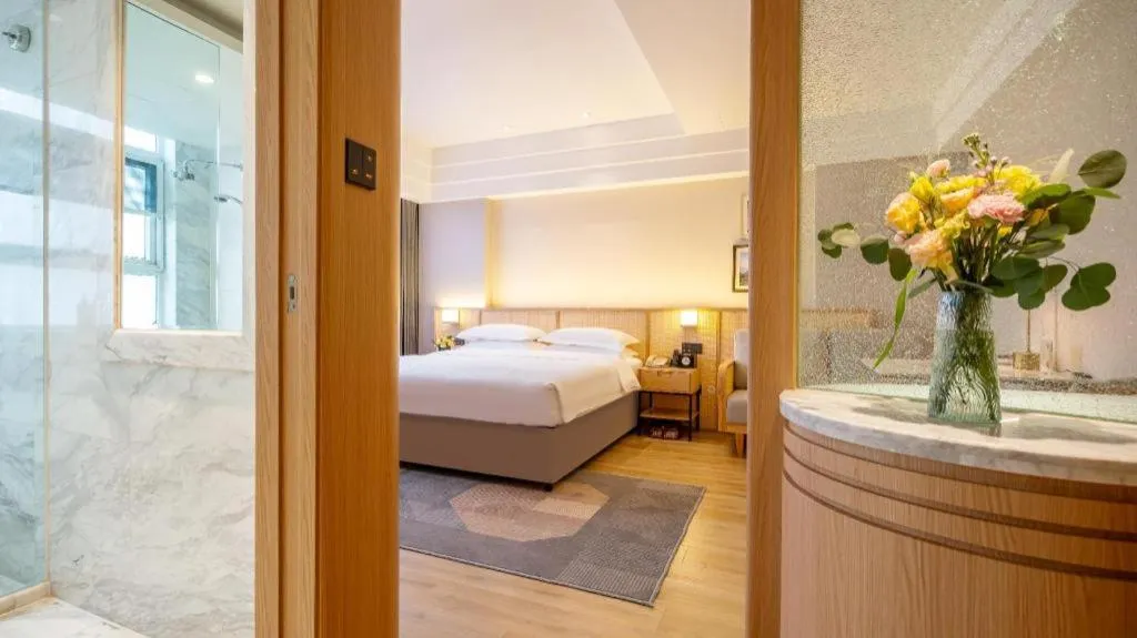 Bed in Gem Flower Jinyu Sunshine Hotel