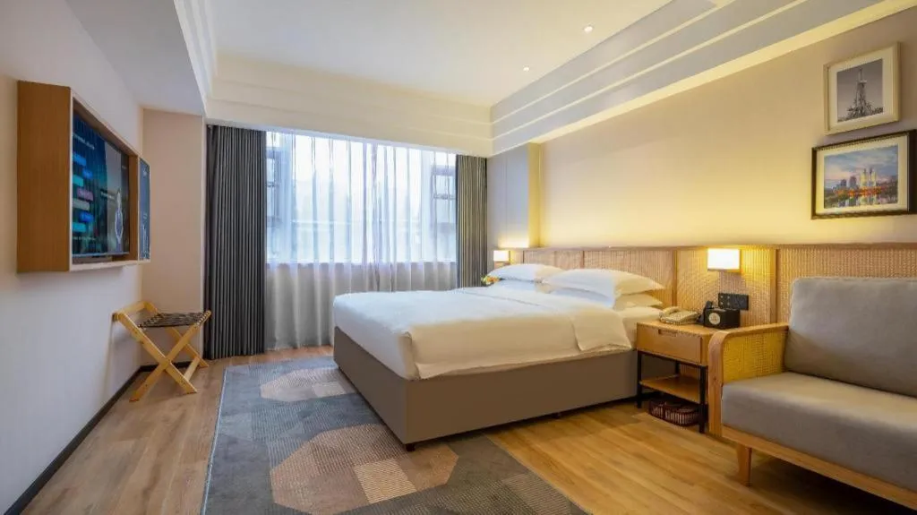 Bed in Gem Flower Jinyu Sunshine Hotel