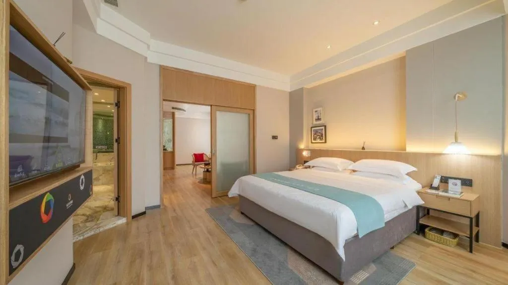 Bed in Gem Flower Jinyu Sunshine Hotel