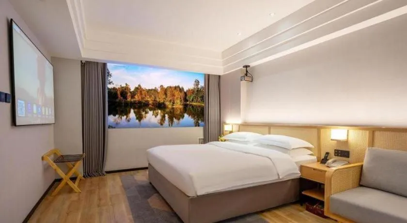 Bed in Gem Flower Jinyu Sunshine Hotel