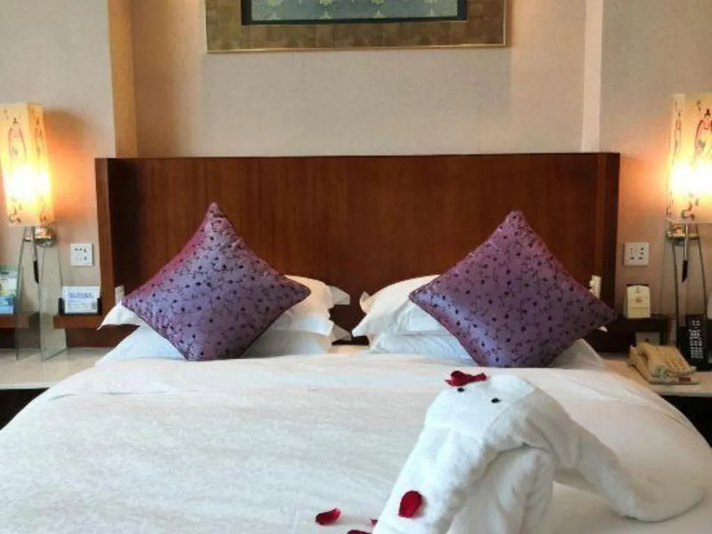 Bed in Gem Flower Jinyu Sunshine Hotel