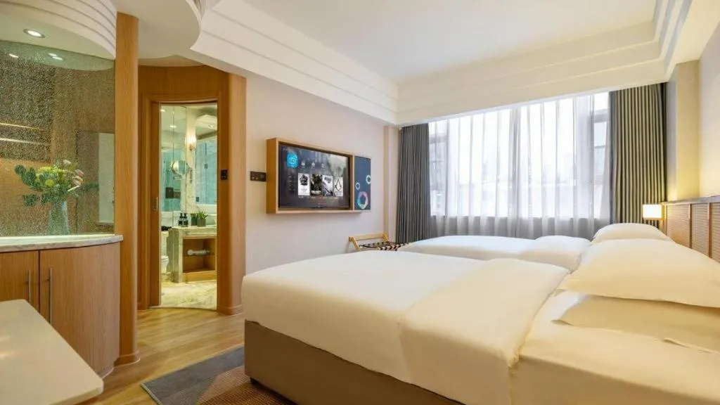 Bed in Gem Flower Jinyu Sunshine Hotel