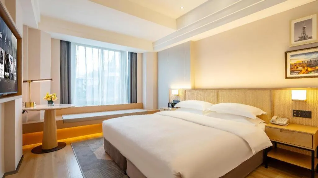 Bed in Gem Flower Jinyu Sunshine Hotel