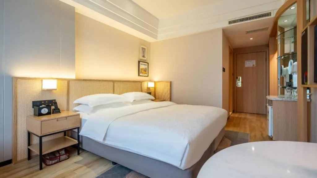 Bed in Gem Flower Jinyu Sunshine Hotel