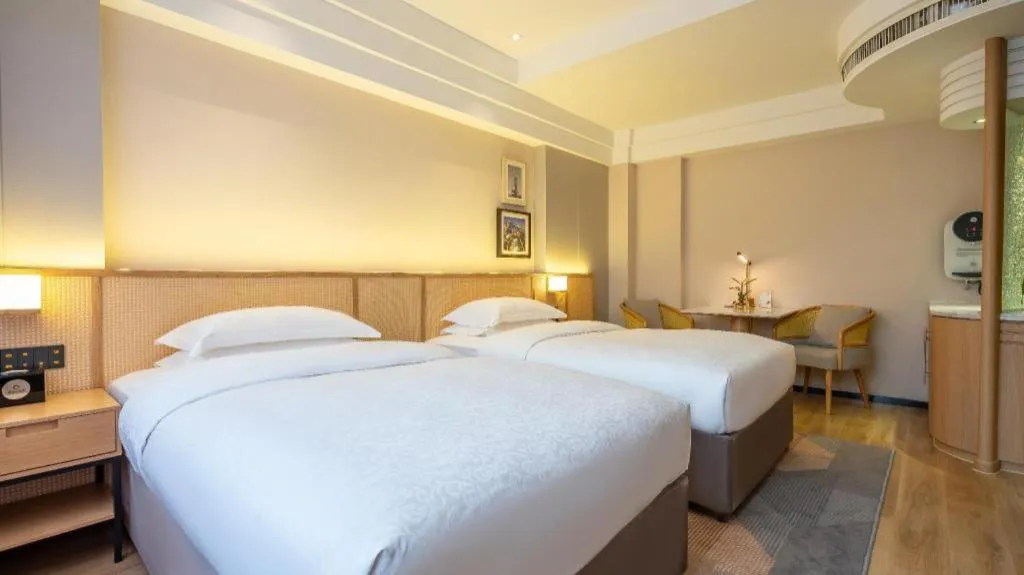 Bed in Gem Flower Jinyu Sunshine Hotel