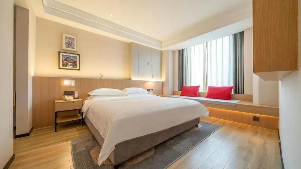 Bed in Gem Flower Jinyu Sunshine Hotel