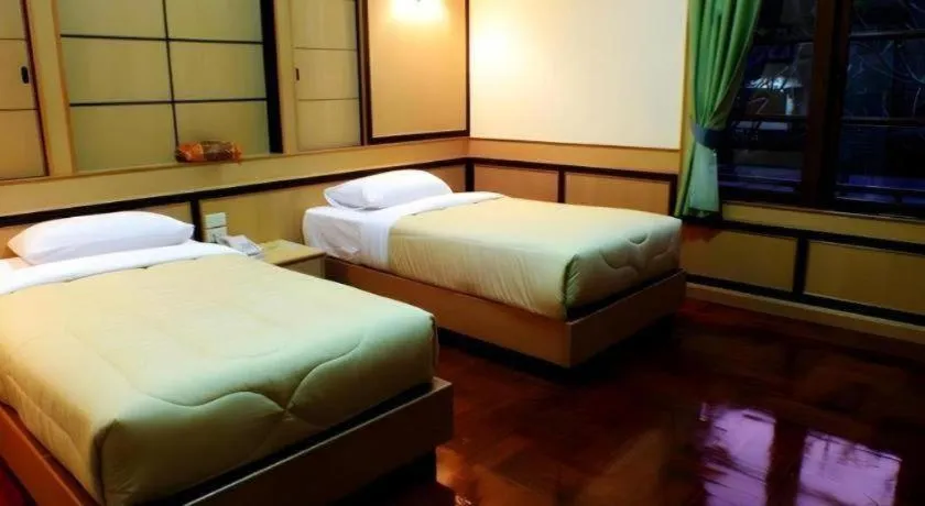 Bed in Siam River Resort