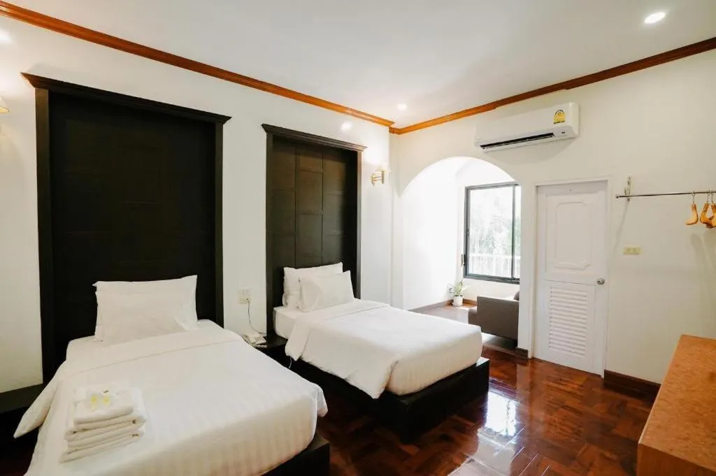 Bed in Siam River Resort