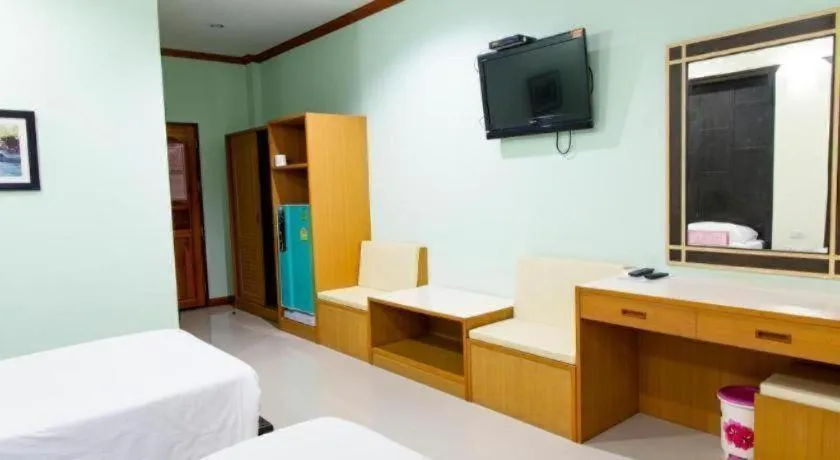 Bed in Baan Ingna Resort Hotel