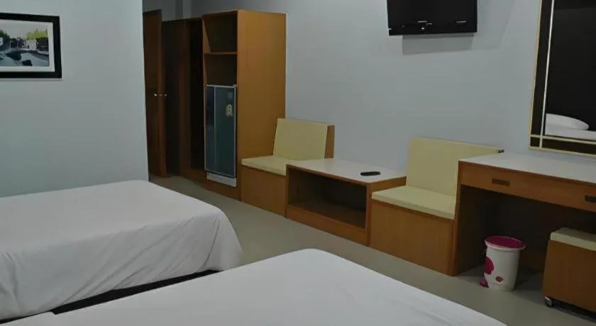 Bed in Baan Ingna Resort Hotel