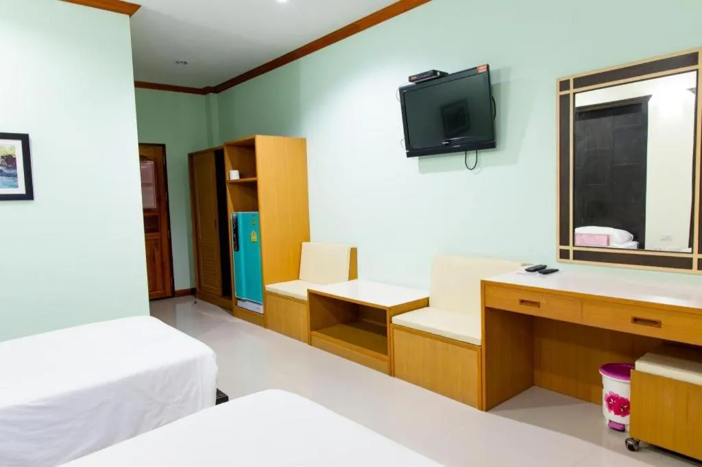 Bed in Baan Ingna Resort Hotel