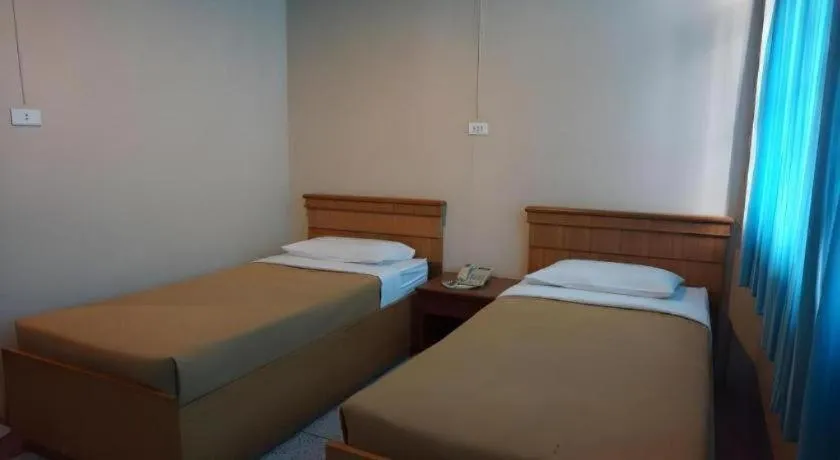 Bed in Supak Hotel