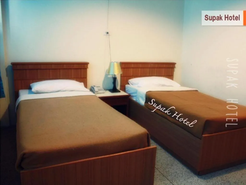 Bed in Supak Hotel