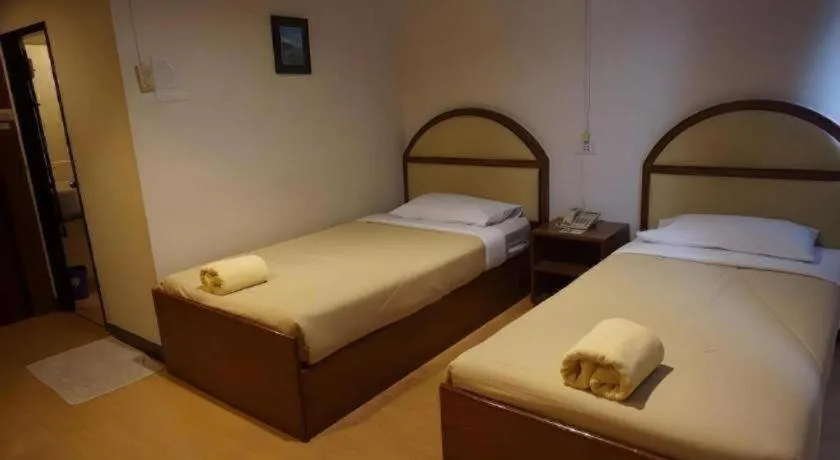 Bed in Supak Hotel