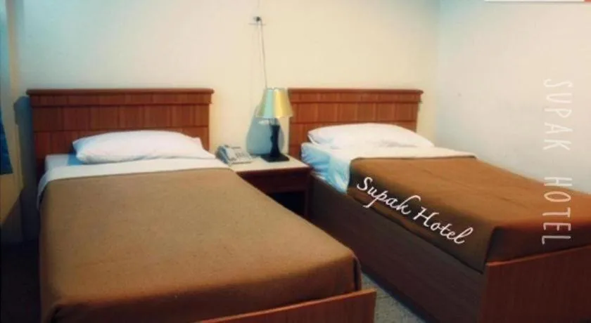 Bed in Supak Hotel