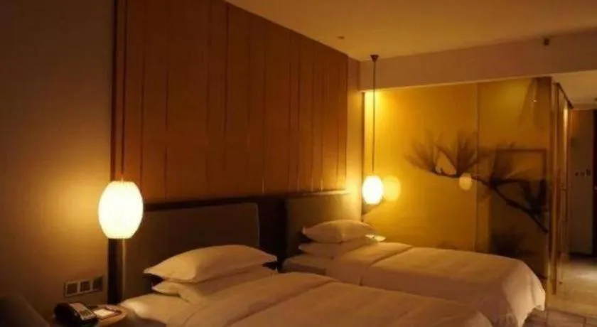 Bed in DongGuan JOYC Hotel 