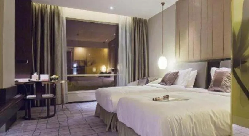 Bed in DongGuan JOYC Hotel 