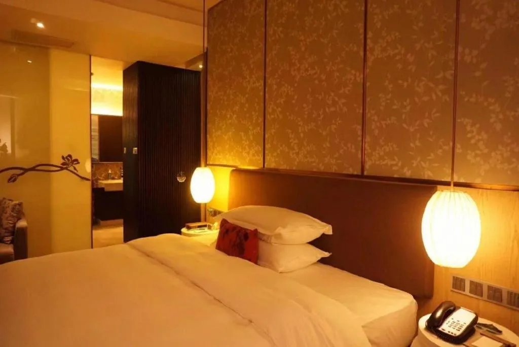 Bed in DongGuan JOYC Hotel 