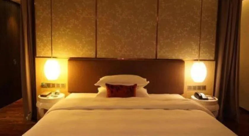 Bed in DongGuan JOYC Hotel 