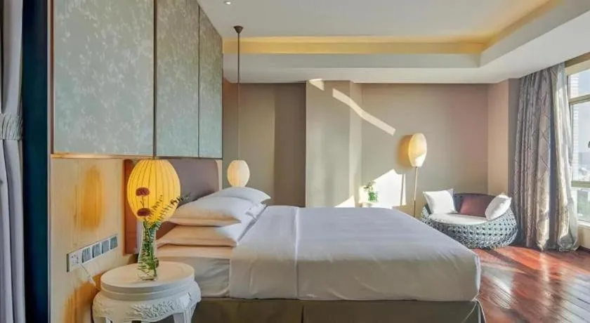 Bed in DongGuan JOYC Hotel 