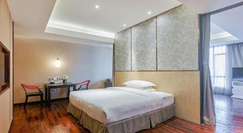 Bed in DongGuan JOYC Hotel 