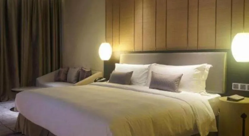 Bed in DongGuan JOYC Hotel 