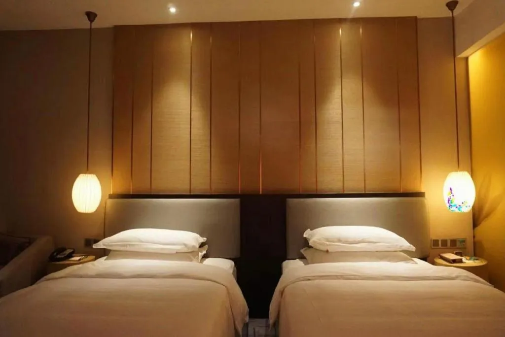 Bed in DongGuan JOYC Hotel 