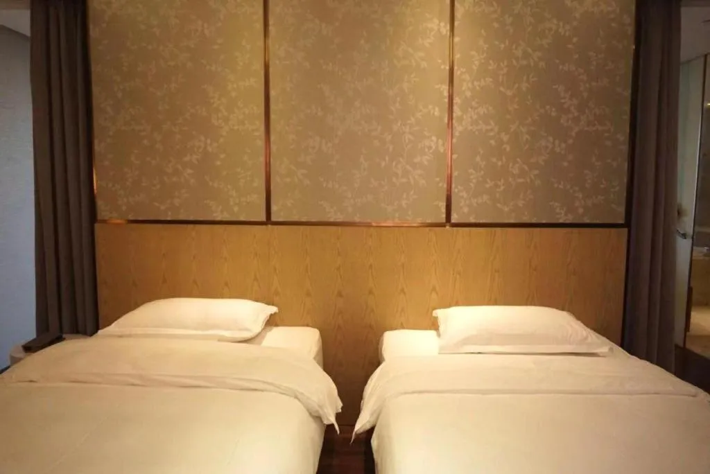 Bed in DongGuan JOYC Hotel 