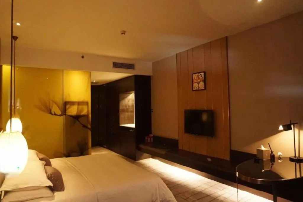 Bed in DongGuan JOYC Hotel 