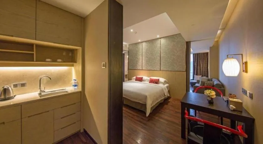 Bed in DongGuan JOYC Hotel 