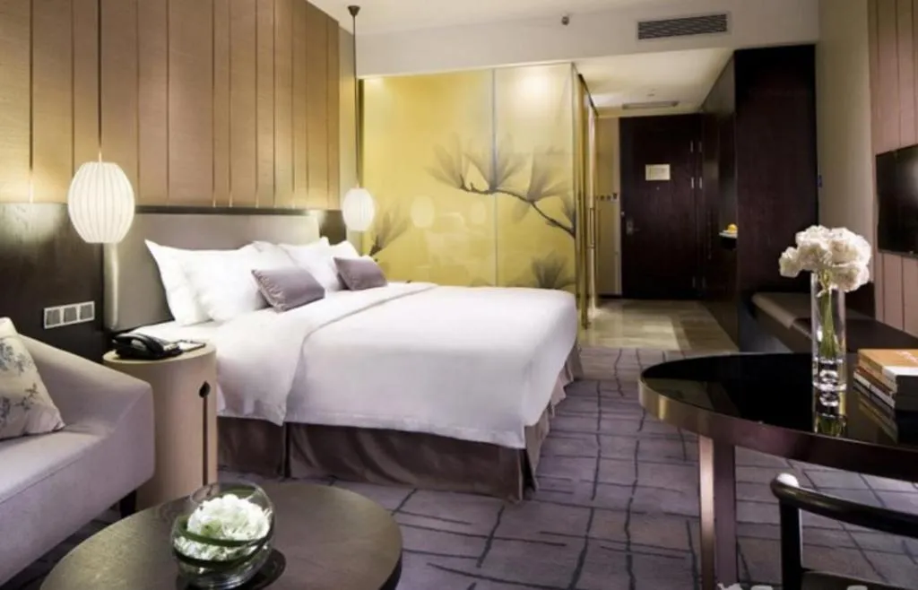 Bed in DongGuan JOYC Hotel 