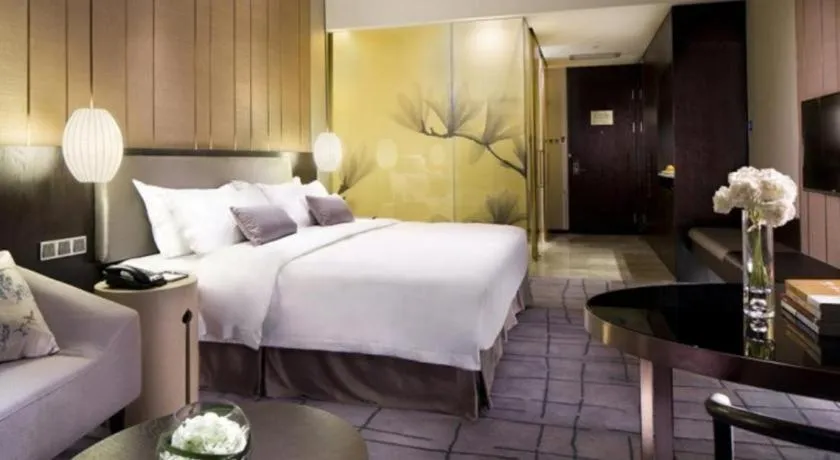 Bed in DongGuan JOYC Hotel 