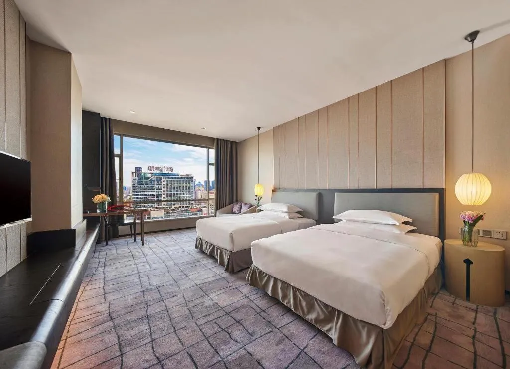 Bed in DongGuan JOYC Hotel 